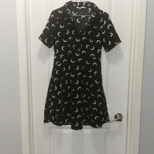 Stylish Black and White Mini Dress Cresent Moon, it has pockets.